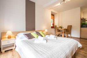 Posteľ alebo postele v izbe v ubytovaní Dolina Resort Zakopane