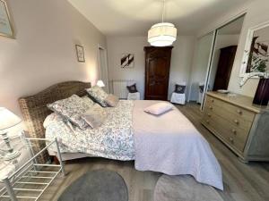 Letto o letti in una camera di Gite des graverots