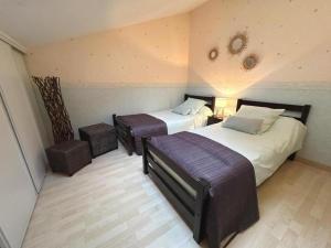 Letto o letti in una camera di Gite des graverots