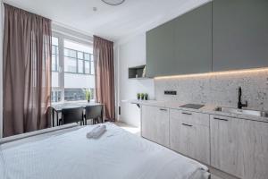 Postel nebo postele na pokoji v ubytování P-ONE APARTMENTS - Self Check-in
