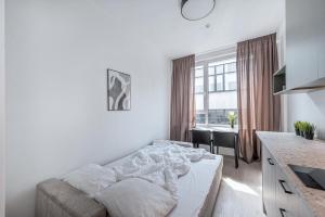 Postel nebo postele na pokoji v ubytování P-ONE APARTMENTS - Self Check-in