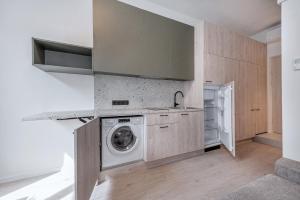 Kuchyň nebo kuchyňský kout v ubytování P-ONE APARTMENTS - Self Check-in