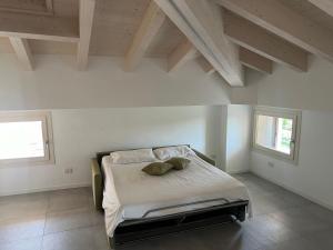 Postel nebo postele na pokoji v ubytování Le Casette SEI + 9 fotografií