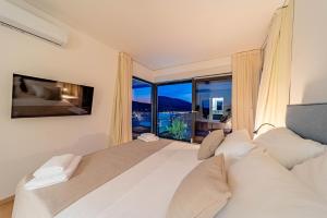 Katil atau katil-katil dalam bilik di Villa View of the city +84 gambar