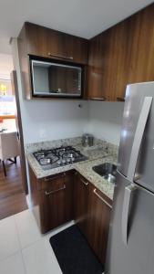 Dapur atau dapur kecil di AP. CENTRO GRAMADO