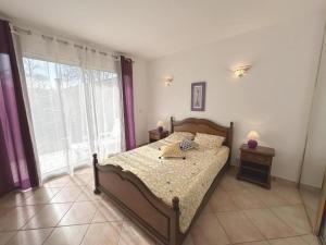 Ένα ή περισσότερα κρεβάτια σε δωμάτιο στο Villa dunisia
