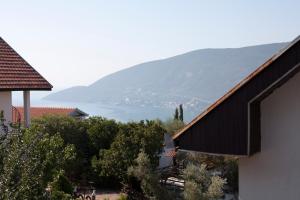 a view of a lake from a house at House by the Sea in Herceg-Novi