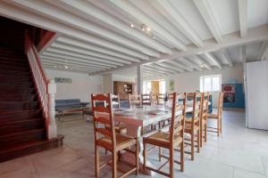 a dining room with a table and chairs at Bordazarria in Juxue