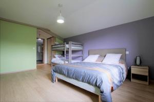 a bedroom with a bed and a bunk bed at Bordazarria in Juxue +28 photos