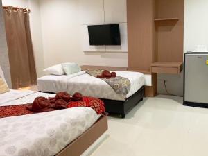 Letto o letti in una camera di The Infinity Suite Chiangrai