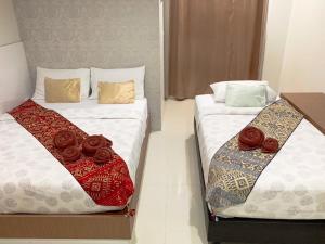 Letto o letti in una camera di The Infinity Suite Chiangrai