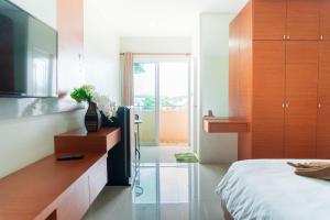 Letto o letti in una camera di The Infinity Suite Chiangrai