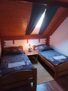 Postel nebo postele na pokoji v ubytování U sedmi zlodějů - Vrbice