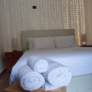 Letto o letti in una camera di Rifugio Baita Belvedere