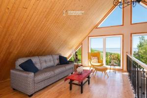 Foto sihtkohas Les Éboulements asuva majutusasutuse Chalet vue sur le fleuve et spa galeriist