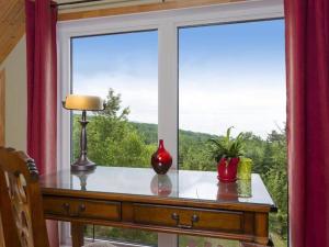 Foto sihtkohas Les Éboulements asuva majutusasutuse Chalet vue sur le fleuve et spa galeriist