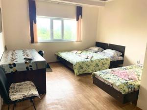 Postel nebo postele na pokoji v ubytování Yukon
