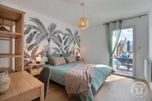 En eller flere senge i et værelse på La villa detente + 49 billeder