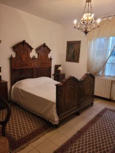 Postel nebo postele na pokoji v ubytování B&B Arcadia + 6 fotografií