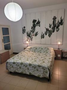 Postel nebo postele na pokoji v ubytování B&B Arcadia