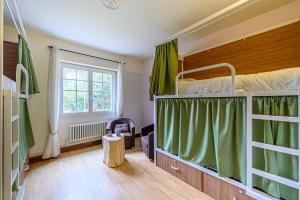 Postel nebo postele na pokoji v ubytování Naéco Erdeven