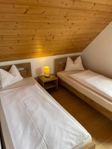 Postel nebo postele na pokoji v ubytování Chata s výhľadom na Tatry