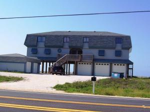 a large house on the side of a road at Boardwalk #3 in Pensacola