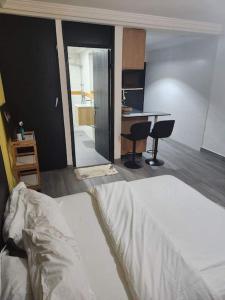 Postel nebo postele na pokoji v ubytování Studio Américain