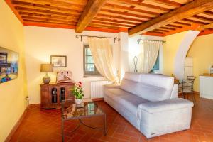 Posezení v ubytování Tenuta Guinigi Antico Borgo di Matraia - Exclusive Holidays apartments & Pool