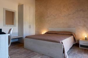 Postel nebo postele na pokoji v ubytování La Rovazzola