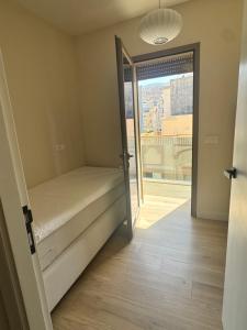 Uma cama ou camas num quarto em belle vue appartement al hoceima