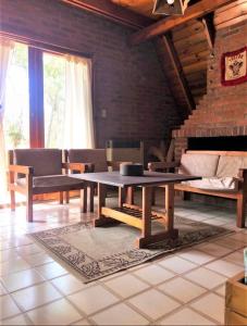 Et opholdsområde på Hermosa Cabaña a metros del mar