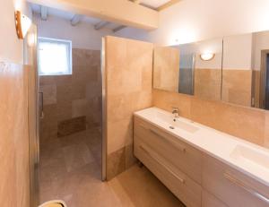 a bathroom with a sink and a mirror at Domaine Saint Julien in Buis-les-Baronnies +26 photos