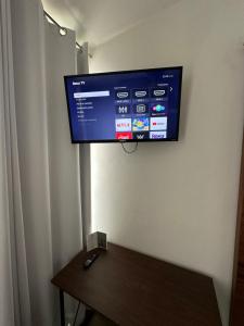a flat screen tv hanging on a wall at Quinta Los Caballos in Ajijic