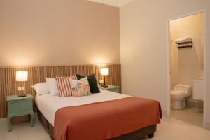 Letto o letti in una camera di Lima Atelier Boutique