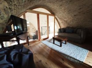 Et opholdsområde på Grande grange atypique proche des Gorges du Tarn