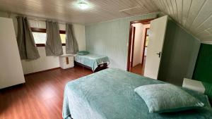 Postel nebo postele na pokoji v ubytování Casa na serra gaúcha!