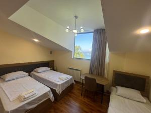 Кровать или кровати в номере Port view Residence