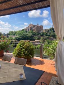 A balcony or terrace at Attico San Francesco