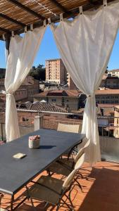 A balcony or terrace at Attico San Francesco