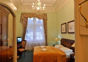 Postel nebo postele na pokoji v ubytování Hotel Ester