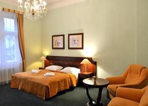 Postel nebo postele na pokoji v ubytování Hotel Ester