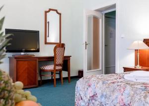 Postel nebo postele na pokoji v ubytování Hotel Ester