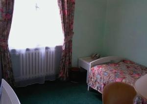 Postel nebo postele na pokoji v ubytování Hotel Ester