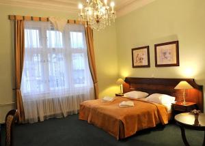 Postel nebo postele na pokoji v ubytování Hotel Ester