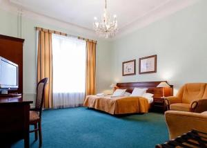 Postel nebo postele na pokoji v ubytování Hotel Ester