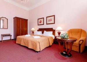 Postel nebo postele na pokoji v ubytování Hotel Ester