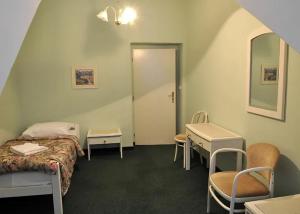 Postel nebo postele na pokoji v ubytování Hotel Ester
