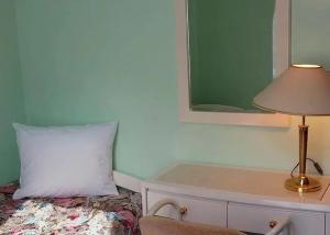 Postel nebo postele na pokoji v ubytování Hotel Ester