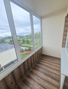 Balkón nebo terasa v ubytování Mažeikių apartamentai